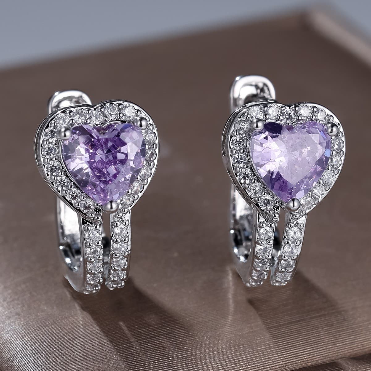 Classic Heart-shaped Hollow-out Ear Clips With Blue Diamonds